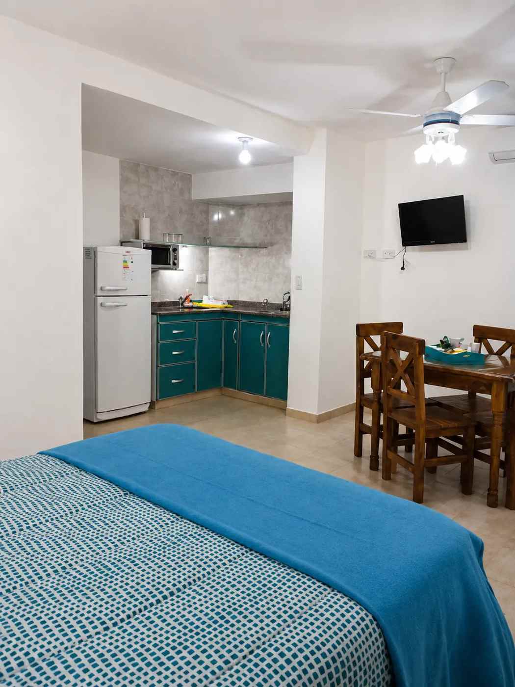 Bright studio kitchenette and dining area